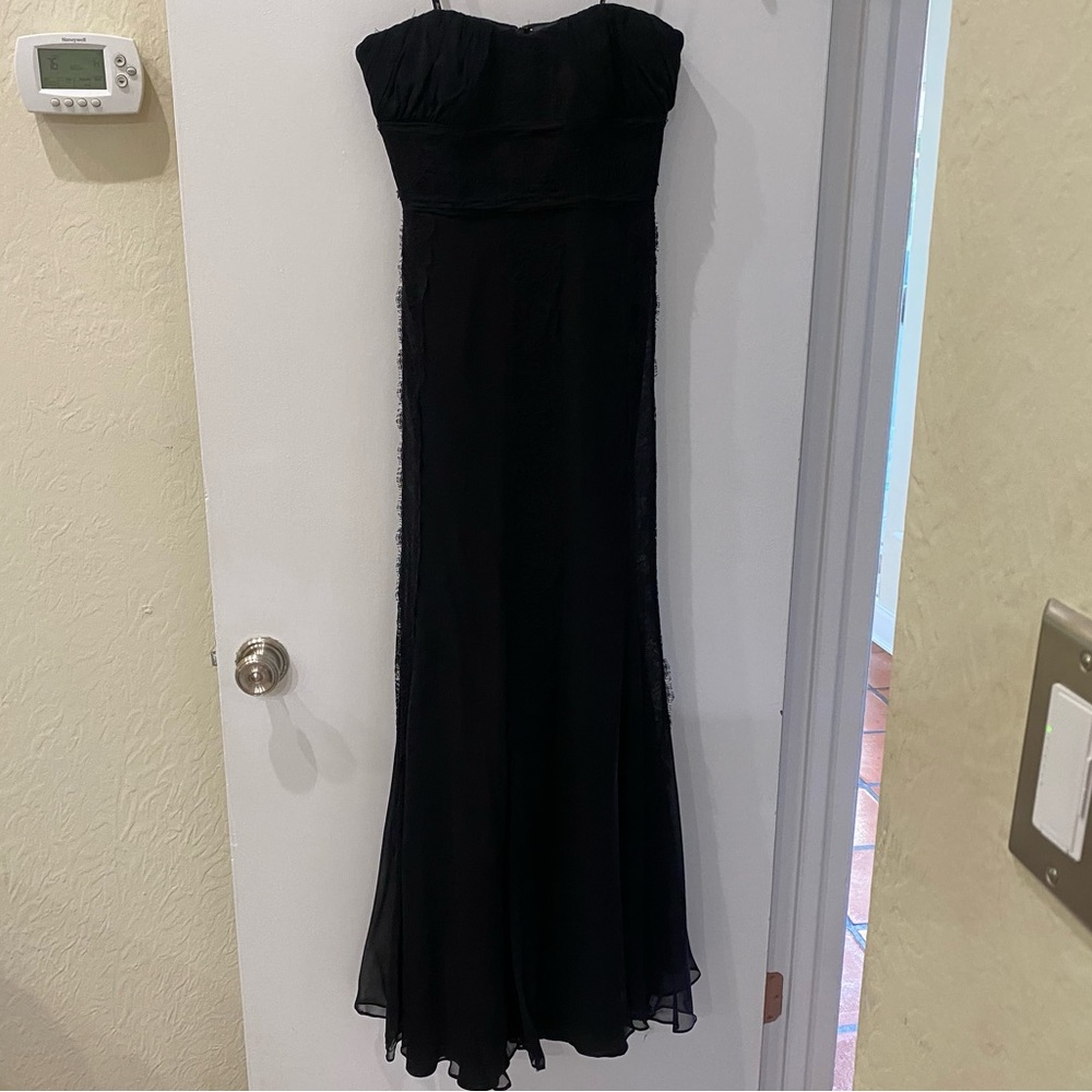 Black strapless gown with black lace detailing